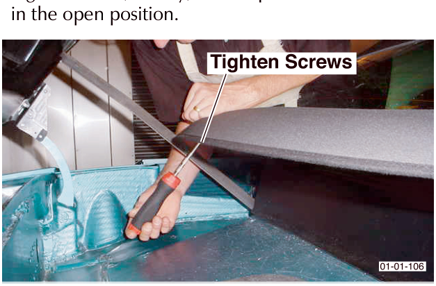 Technician tightening trim strip screws on the open convertible roof with text overlay 'Tighten Screws'