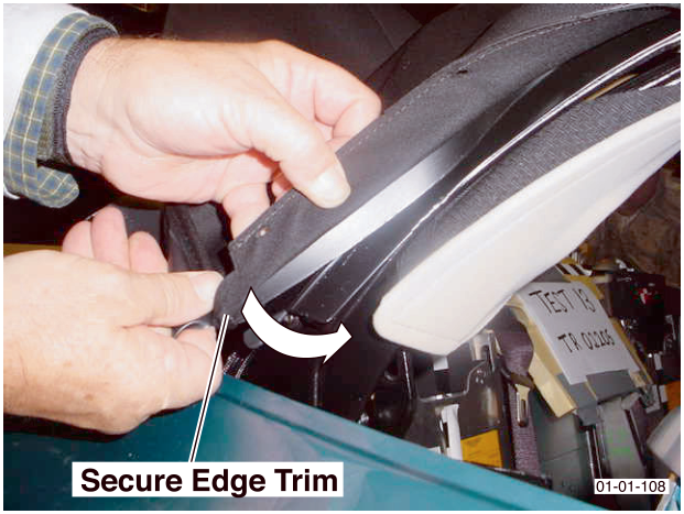 Hands installing the roof material edge trim over the roof side frame with text overlay 'Secure Edge Trim'