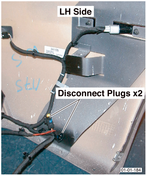 LH side interior view showing two electrical plugs to disconnect