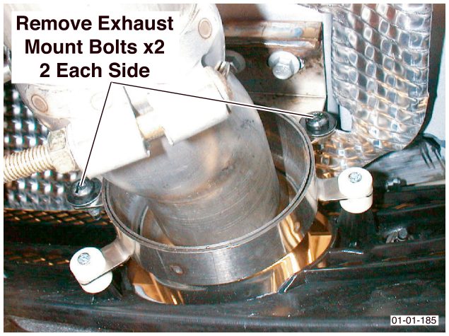 Exhaust system showing two bolts securing the exhaust mount to the end pipe trim, labeled Remove Exhaust Mount Bolts x2 2 Each Side