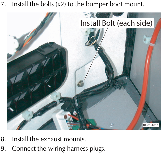 View of bumper boot mount area showing wiring harness and an arrow pointing to a bolt location with text 'Install Bolt (each side)'