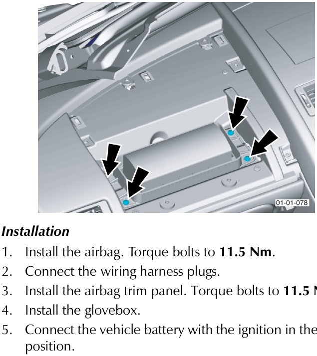 Hands disconnecting two wiring harness plugs located behind the dashboard airbag module.