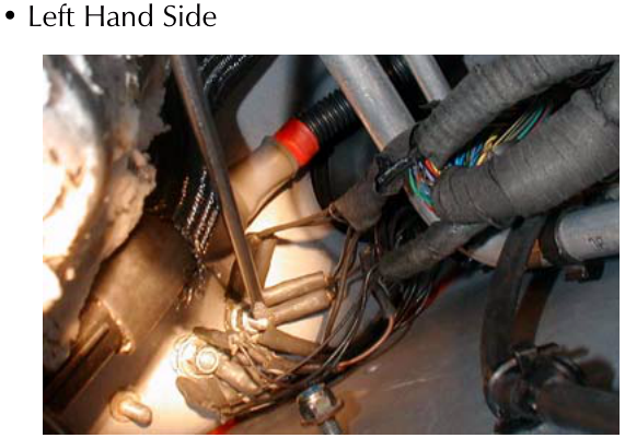 A photograph showing earth connection points on the left hand side of the bulkhead.