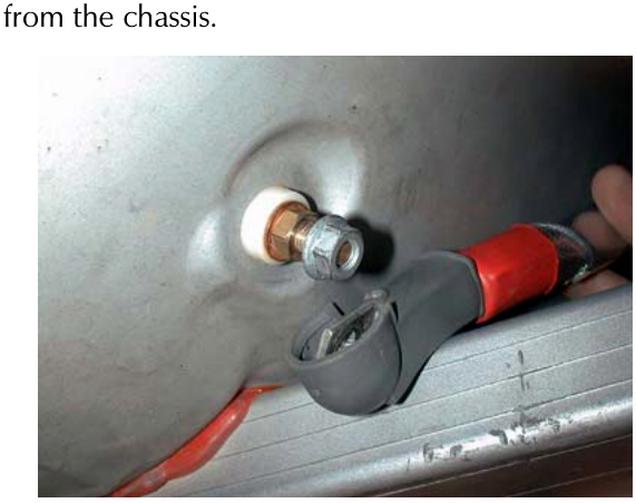 Close-up photo of an earth lead connection point on the vehicle chassis