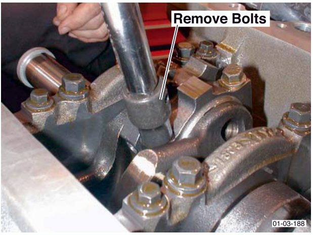 Image showing withdrawal of the oil seal retainer and seal with a mallet