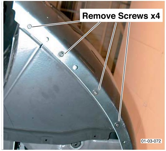 View of the inner wheel arch liner with four screws indicated for removal