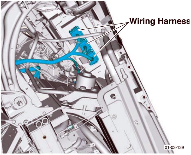 View of wiring harness connectors in the vehicle chassis area