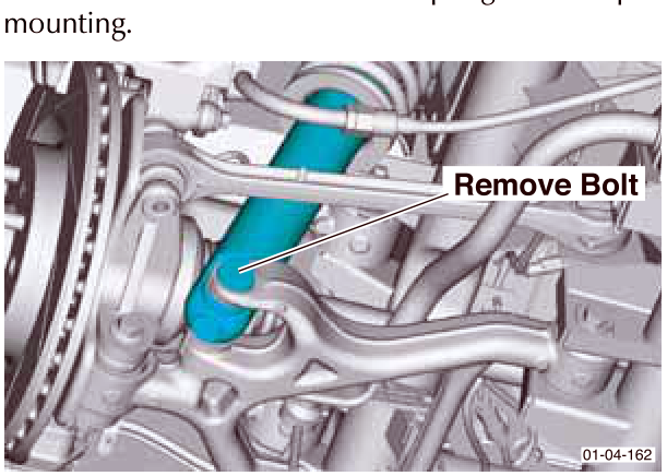 View of the bolt being removed from the lower spring and damper mounting