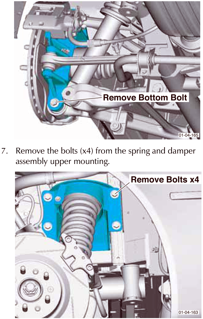 View of the vertical link lower bolt being removed