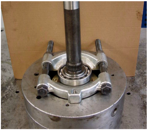 Photo of the output shaft assembly held in a vice or stand