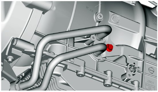 View of a metal pipe clamp securing two grey coolant pipes to the gearbox casing