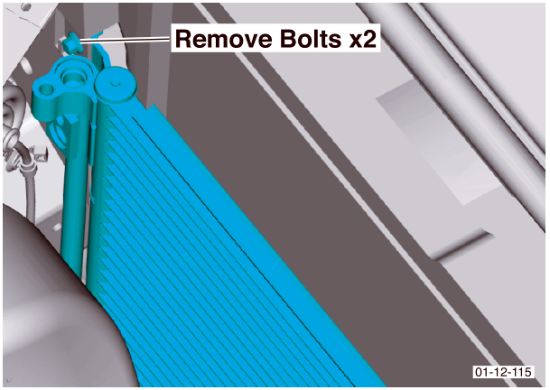 View of condenser mounting bolts being removed