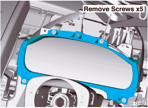 Illustrates removal of five screws securing a car's hood latch cover