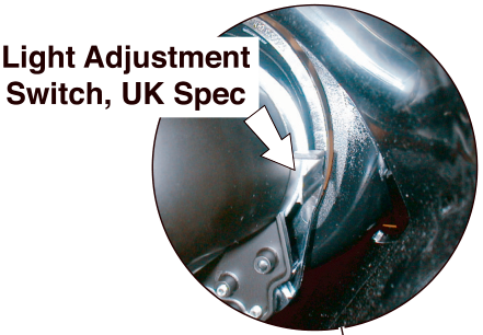 Light Adjustment Switch, UK Spec showing circular adjustment mechanism with white arrow pointing to the switch