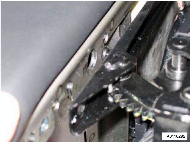 Close-up of the 6-way height adjuster mechanism being slid out