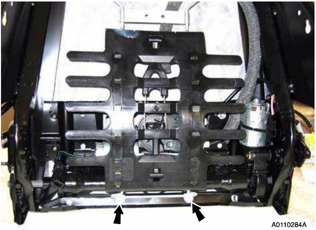 Lumbar support frame with arrows indicating screw locations