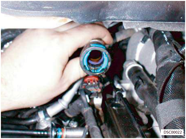 Expansion tank being disconnected from engine hose