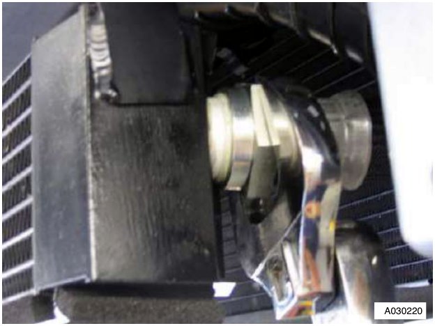 View of the oil cooler and pipe connection area
