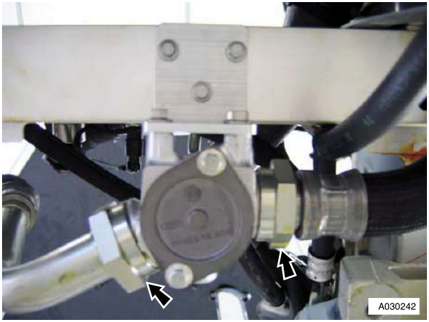 View of the oil thermostat, controller, and connected pipes