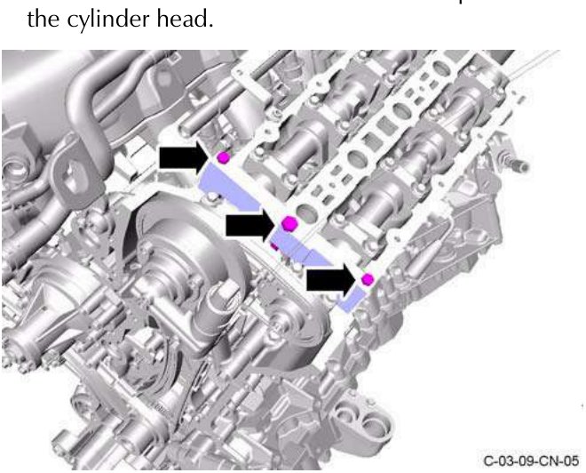 Three screws removed from cylinder head, part number 43-27956 shown