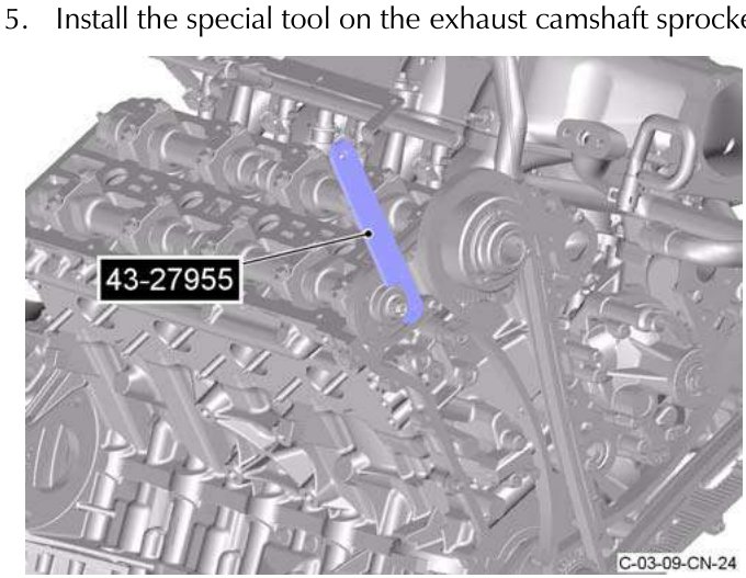 Special tool installed on exhaust camshaft sprocket, part number 43-27955
