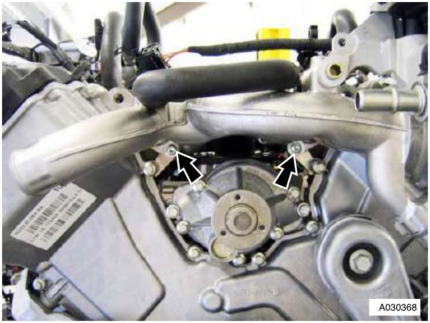 Engine with coolant manifold and Torx bolts highlighted