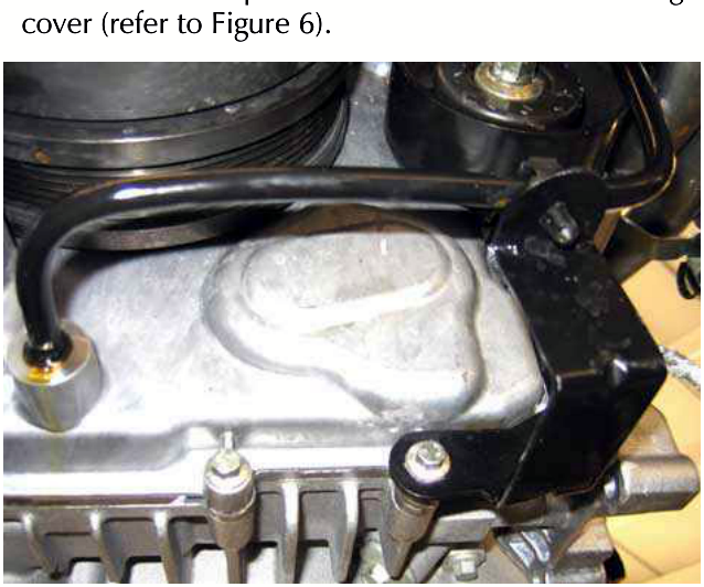 Engine with oil separator drain tube and timing cover