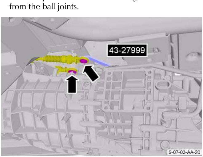 Gear selector cables being released from ball joints, part number 43-27999 visible