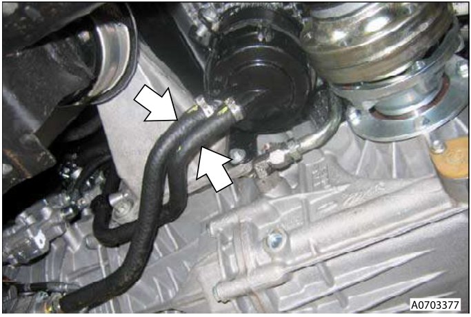 Reservoir hoses connected to valve unit and pump