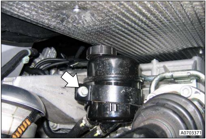 Close-up of oil cooler pipes and connections on the transaxle