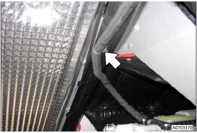 Harness clip being released from subframe