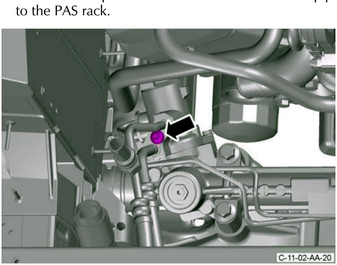 The screw attaching the PAS pipes to the PAS rack, with a black arrow pointing to it.