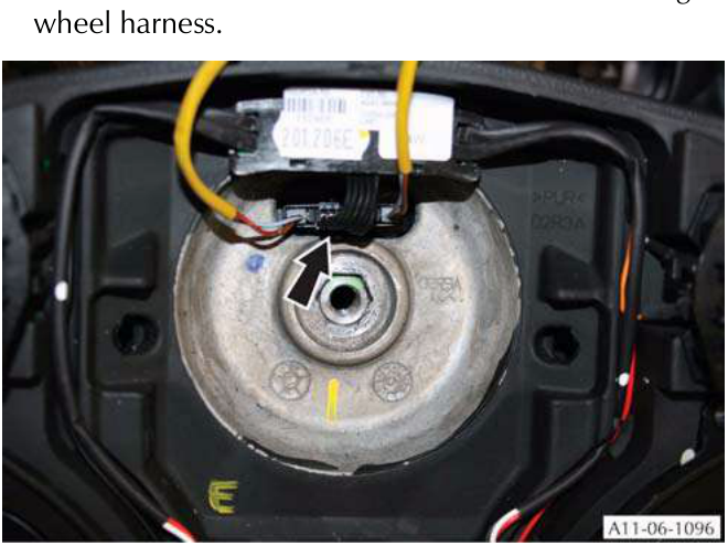View of the rotary coupler and wiring harness behind the steering wheel hub