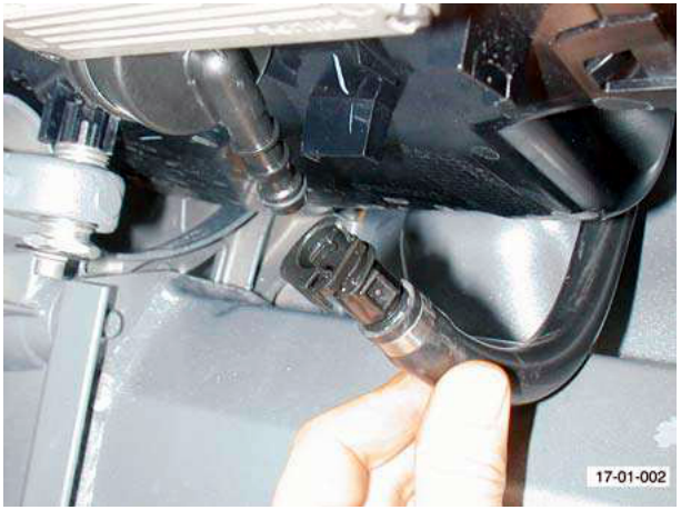 Hand disconnecting headlamp washer supply hose