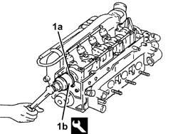 CAMSHAFT IN CYLINDER HEAD - R.R. WITH HEAD REMOVED
