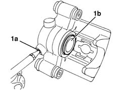 REAR BRAKE CALIPER, REMOVED - OVERHAUL
