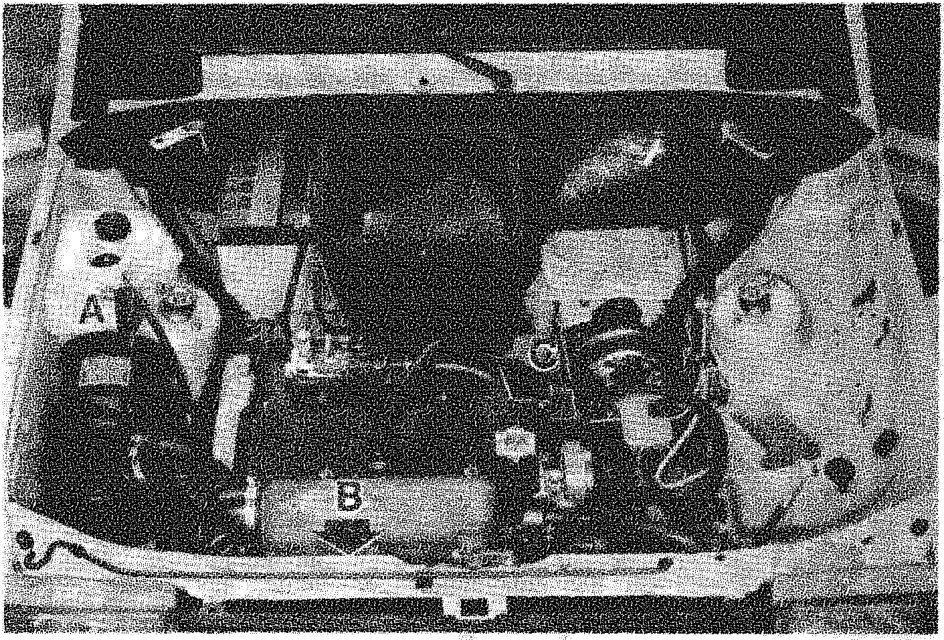 View of the engine compartment showing locations A, B, and C marked on components
