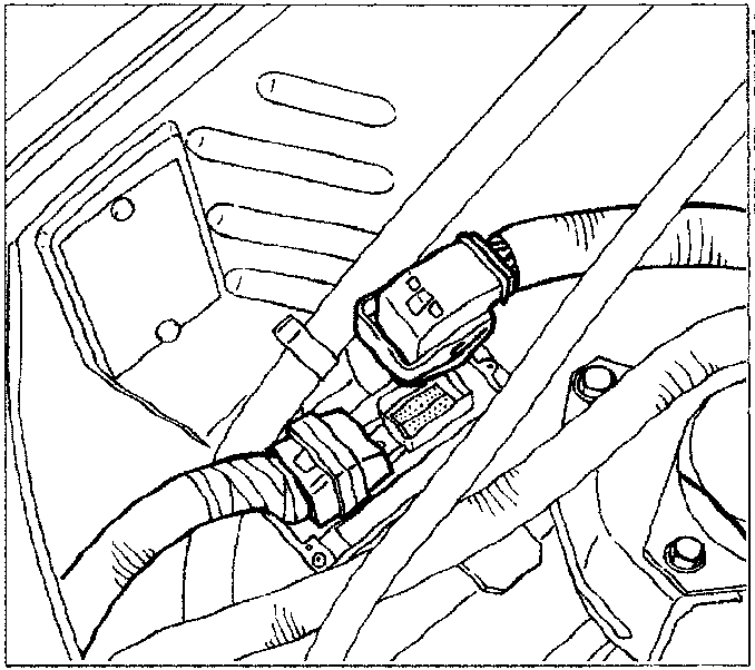 Illustrates fuel injector connection and securing mechanism