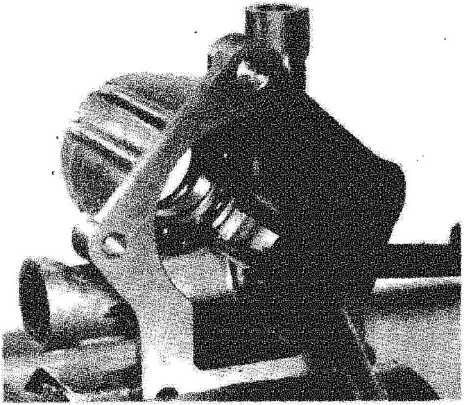Power output shaft assembly with a tool engaged on the bearing retaining ring