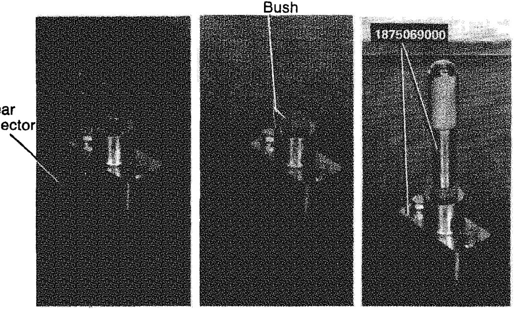 Fitting bushes on gear selector and engagement control rods, showing labels for Gear selector, Bush, and part number 1875069000