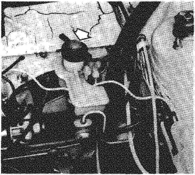 Brake fluid reservoir located on the master cylinder in the engine compartment