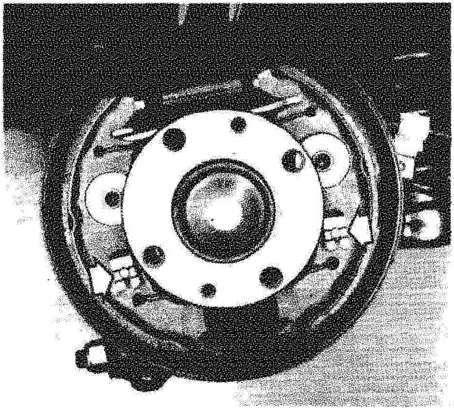 Rear brake assembly showing the positioning of the self-adjusting device