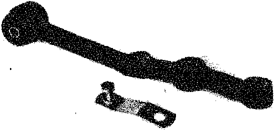 A black track control arm with a bush and a metal clip component