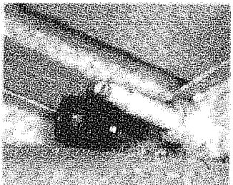 Close-up view of a component on the underside of the vehicle