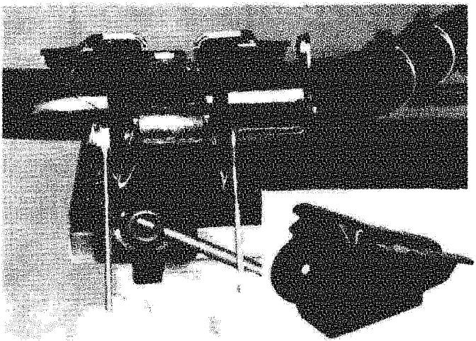 Bracket anchoring the rear axle to the bodyshell with tools applied