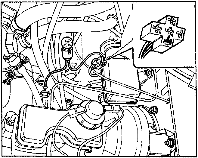 Photographic view of the engine compartment showing the location of the multiple connector on the pre-heating control unit