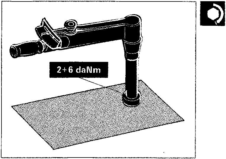 A torque wrench being used on a bolt, with a label reading '2+6 daNm'.
