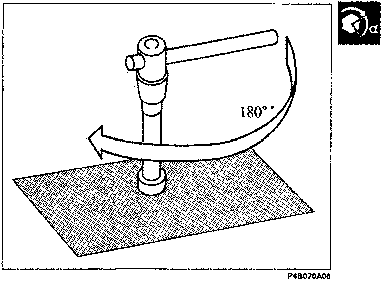 A spanner turning a bolt through an angular rotation of 180 degrees.
