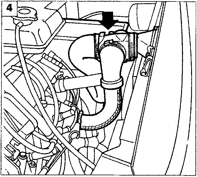 Engine bay detail showing hot air pipe connection with arrow callout