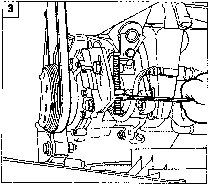 Diagram showing a hand using a tool to loosen the belt tension adjustment screw on the compressor.